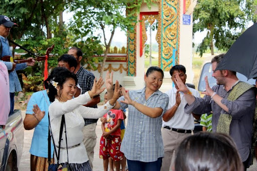 Family and friends dance in the Esarm way Prayoon, yoon, Nalinrat