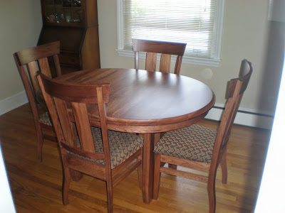 50 x 42 Montreal Dining Table with Oval Tabletop and Notched Table Edge, Monaco Chairs, Calico Hickory