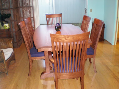 70 x 42 Western Dining Table, Curved Tabletop, Custom Lancaster Chairs with Fabric Seats, Mahogany oak