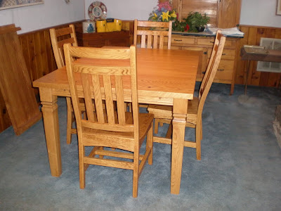 Corsica Dining Table and Trestle Dining Chairs in Honey Oak