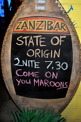 sign 26/5/10-Fans watch State of Origin on a jumbo screen at Calypso Backpackers Resort in Cairns, QLD. Photo by Bobbi Lee Hitchon