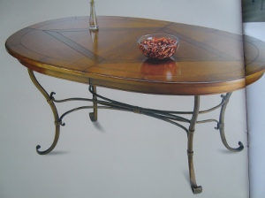 Table ovale piètement fer forgé