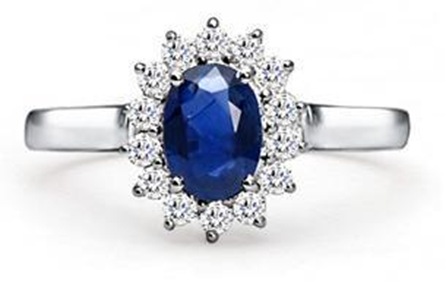 sapphire and diamond ring. The oval blue sapphire is