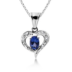 Oval Tanzanite and Diamond Border Heart Pendant