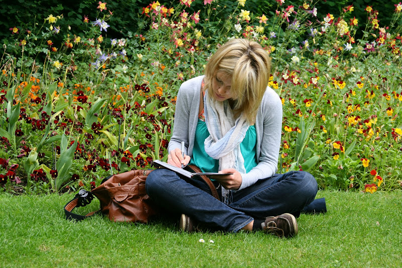 girl writing a book review girl writing a book review