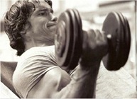 Arnold Schwarzenegger incline curl