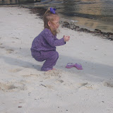 Brooklyn actually playing in the sand.