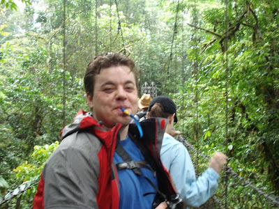 Matt and Kathy hike a lot, so they have a Camelpack -- a backpack with a water system in it.  Its flexible straw reaches into your mouth, and you bite on it to release the water so it doesn't leak all over you all day.  Matt is wearing it under his raincoat because it rained on and off all day.