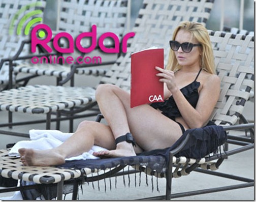 Lindsay spent the afternoon with sister Ali and a friend by a pool in Hollywood CA_ Lindsay looked very relaxed sunbathing and reading what looked like to be a script to her sister and friend_ Lindsay chose to hide away from the media as it was said today that her Scram bracelet indicated that she had drank alcohol at an after party for the MTV movie awards last Sunday.AKM Images  06_08_10   Premium Exclusive_   Internet CALL for fee.Alex 310 3478241.alex_akmimages.net