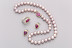 Natural pink pearls and pink sapphire, clasp, ring and earrings Natural pink pearls and pink sapphire, clasp, ring and earrings