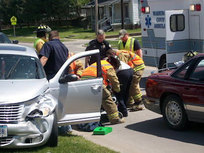 Rescue crews secure a person injured in the crash in front of Washington City Hall to a stretcher for transport by ambulance (KCII NEWS) Rescue crews secure a person injured in the crash in front of Washington City Hall to a stretcher for transport by ambulance (KCII NEWS)