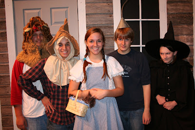 Left to right: Cowardly Lion (Michael Darby), Scarecrow (Will Dehogues), Dorothy (Katie Nisly), TinMan (Sam Swartzendruber), Wicked Witch of the West (Aliese Gingerich). (Photo Submitted by IMS) Left to right: Cowardly Lion (Michael Darby), Scarecrow (Will Dehogues), Dorothy (Katie Nisly), TinMan (Sam Swartzendruber), Wicked Witch of the West (Aliese Gingerich). (Photo Submitted by IMS)