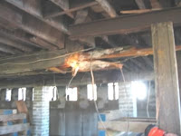 The main support beam for the building is rotted and severely damaged.<br />
(Washington City Hall)