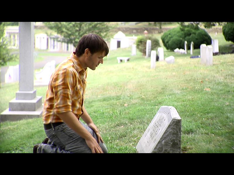sitting%20at%20grave.jpg