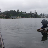 A Lone Fisherman Fishes in the Rain