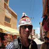 Al trys on some warm headwear