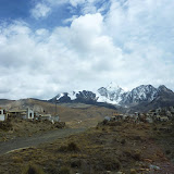 Huayna Potosí stands guardian over a roadside cemetery