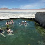 A dip in a hot spring as a freezing breeze whistles across the altiplano