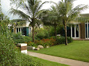 Beach Villa surrounded in lush greenery.