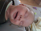 Audrey is just beginning to smile for something other than gas. It usually happens when she's drifting off into sleep, but more and more, she's smiling while she's awake. Tough to catch a photo so far of it, but it happens.
