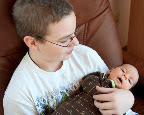 Here's Wyatt holding his new cousin. What a champ. He's like an old pro at this.