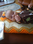 Audrey sometimes really, REALLY concentrates on one of her hands. Today, it's the right hand. Five minutes of this and then it was in the mouth. Good times!
