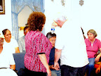 We saw this lady receive an amazing deliverance from excruciating hip pain. She had come in on braces or crutches. She was walking without them after much prayer. God told me to symbolically pour a botlle of water over her.