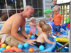 Babies and mike in pool