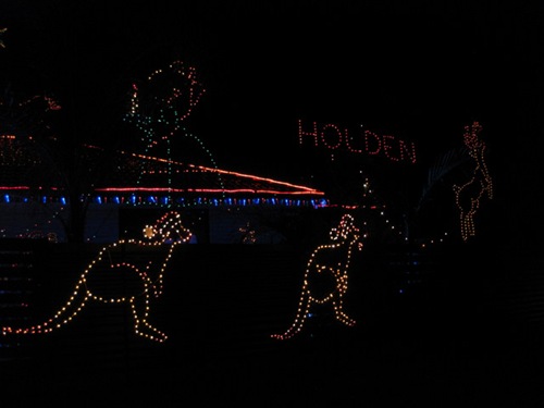 xmas lights on house, inc the word 'holden' (brand of car)