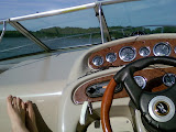 Underway, full tilt, feet up, cruiser style. We're going 0, a difficult nautical maneuver (or my speed-o tube needs to be put back on after trailering...derf).