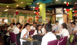 February 24: Students relax inside Nestle Ice Cream House while awaiting for plant tour.