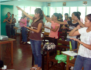 Day 3 - Students sign "Our Father"