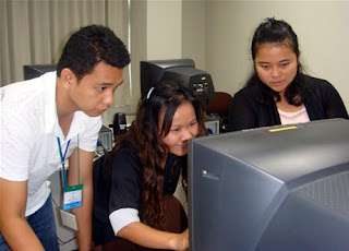 Day 9 - Sir Edmond assists two participants from Thailand.