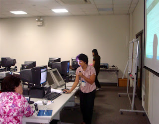 Day 10 - Ms. Marlene Mariano of PWD Association of Makati City explains her Joomla designed website.