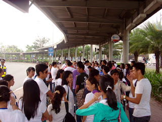 Students wait at the SM Mall of Asia Grounds.