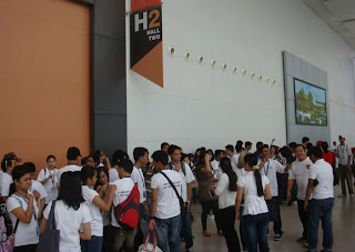 Students wait for their turn to enter the exhibit hall.
