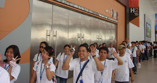 Students walk in line before entering the exhibit hall.