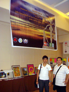 Lucky Paltep and Sir Ervin pose in Rights of Disabled Persons Booth.