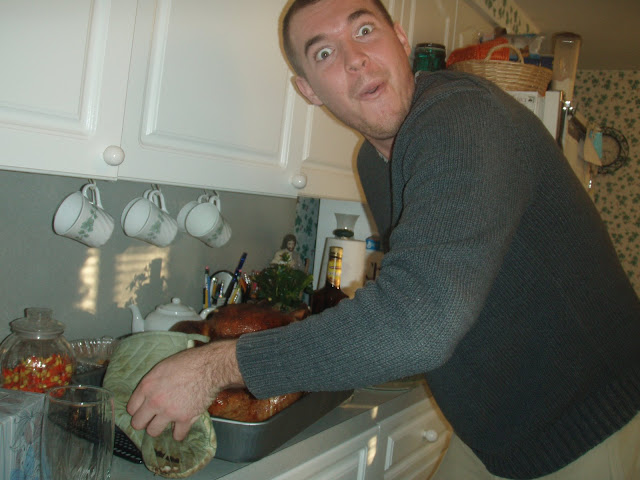 Excitedly pulling out the Wink/Dolan family turkey on Thanksgiving 2008.