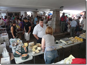 Cheese market ((back of) Morag standing next to the pillar)