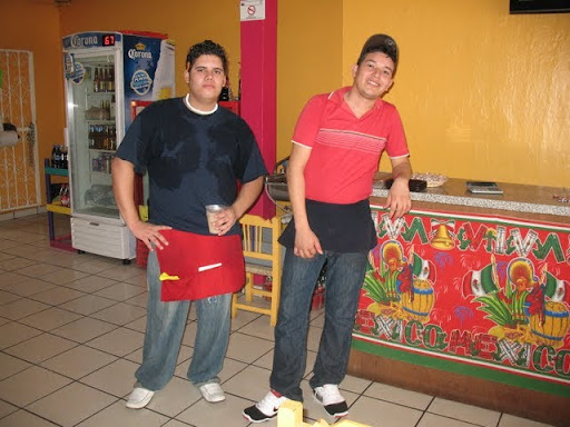 El Pollito restaurant in la Peñita de Jaltemba, Nayarit, Mexico  waiters Carlos and Oscar