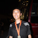 Olympic Gold Medalist?  Or street hawker ...