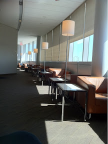 a row of tables and chairs in a room