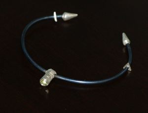 Titanium, fine silver, and peridot bracelet Titanium, fine silver, and peridot bracelet