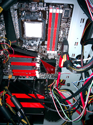 Motherboard and power supply in computer case