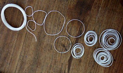 Flattened sterling silver wire becomes frames and also fills the frames