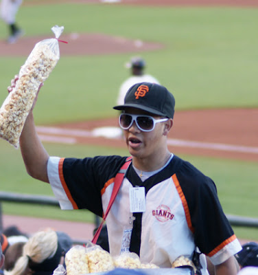 Taking pictures of the baseball game was a little difficult. You can see why.... Popcorn anyone?