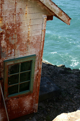 Nature painted this building to look good next to the ocean at Point Reyes Lighthouse