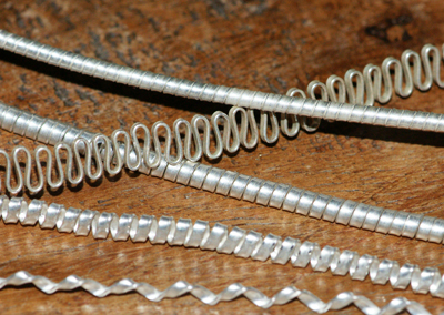 Variations of wrapped wire and flattened wire