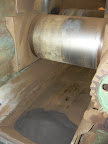 These 3mm parts are being crushed between these two large iron rolls to become Ebonite Powder.